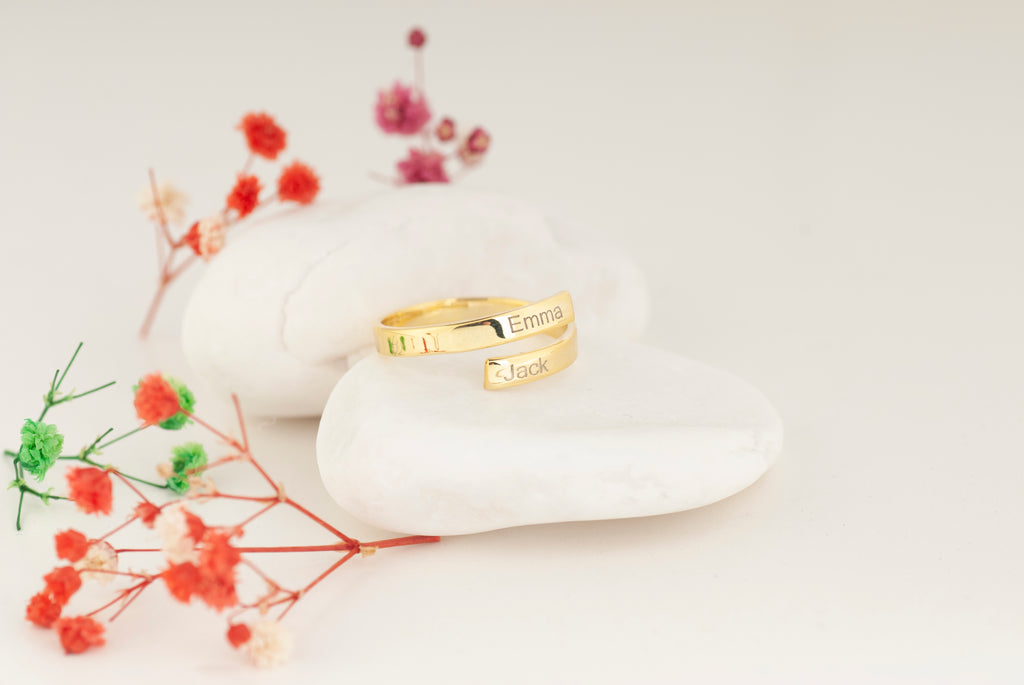 Close-up of engraving on a custom double band name ring