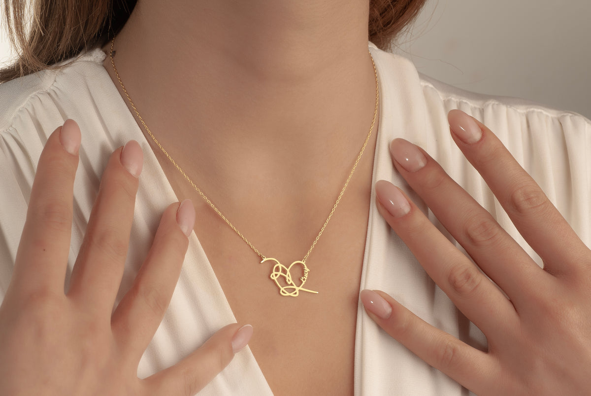 Custom heart necklace personalized with the name Lucy