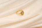 Personalized graduation class ring worn on hand