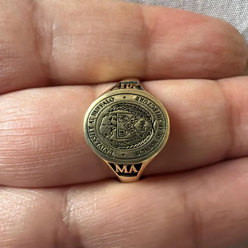 School logo engraved class ring in yellow gold