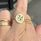 Personalized graduation ring with university crest