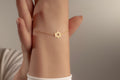Tiny Star of David bracelet with a delicate gold chain