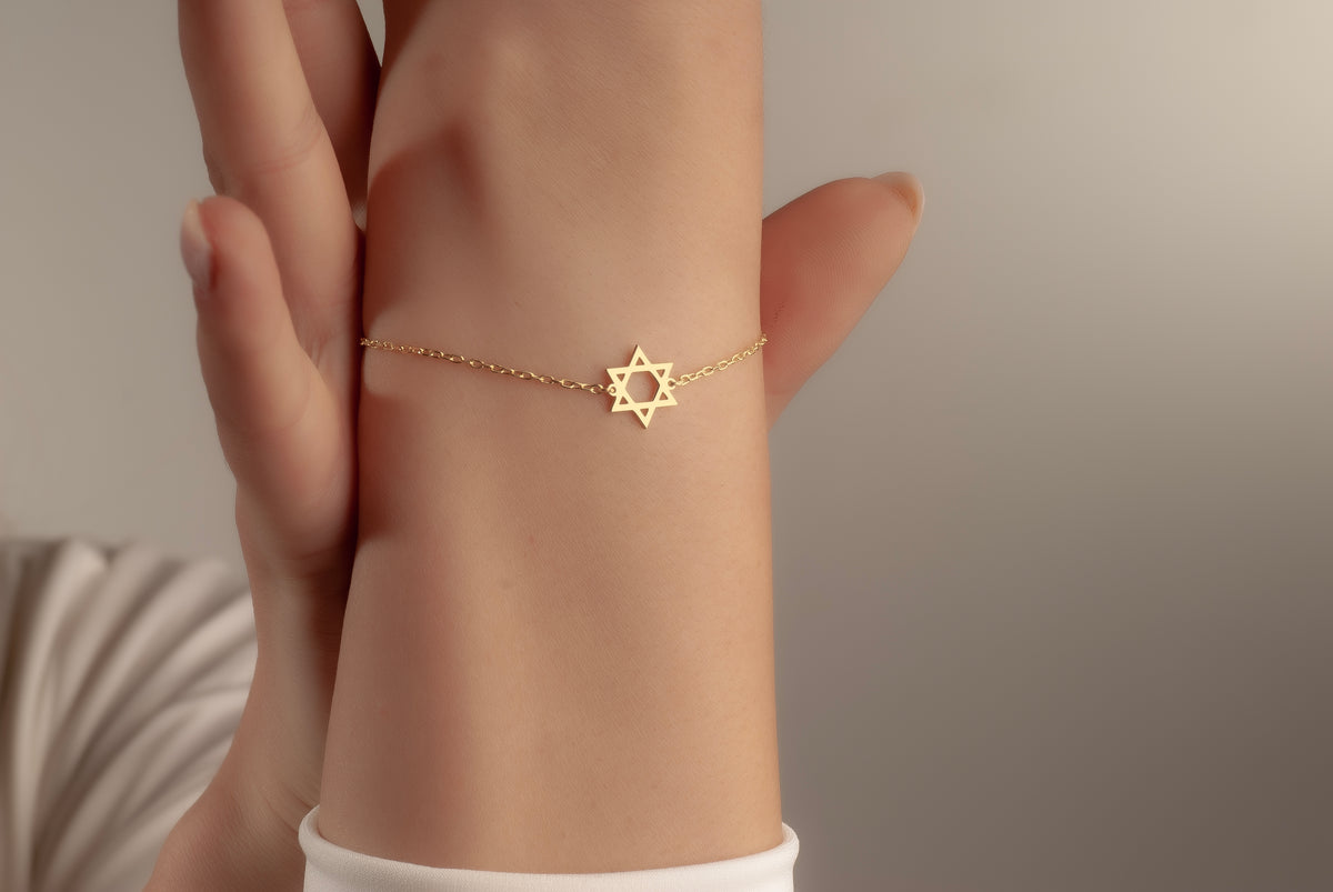 Tiny Star of David bracelet with a delicate gold chain