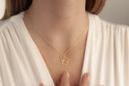 Woodland animal necklace shown at natural wearing length