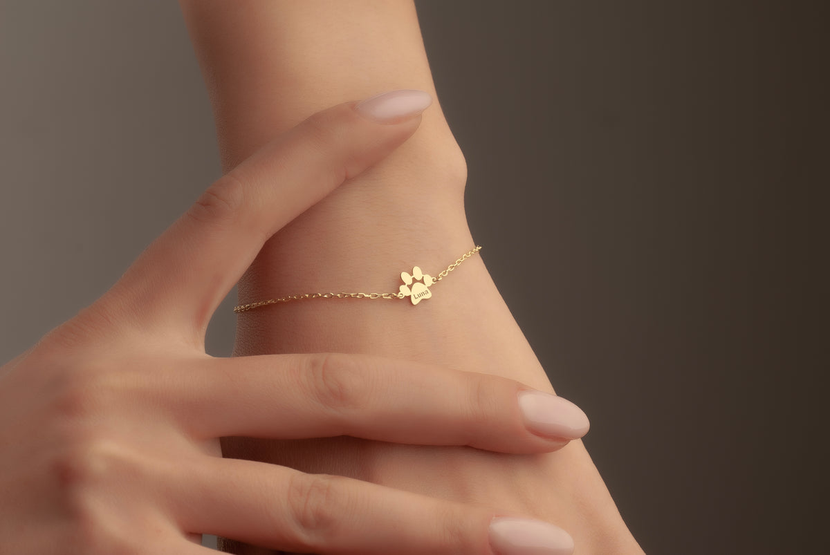 Custom pet bracelet with one personalized paw charm