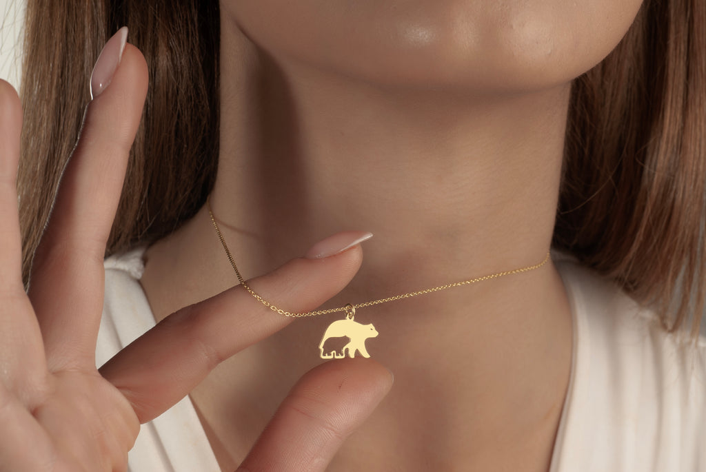 Mother and baby bear necklace shown at natural wearing length