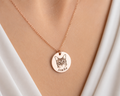 Personalized pet photo necklace with an engraved dog portrait and name