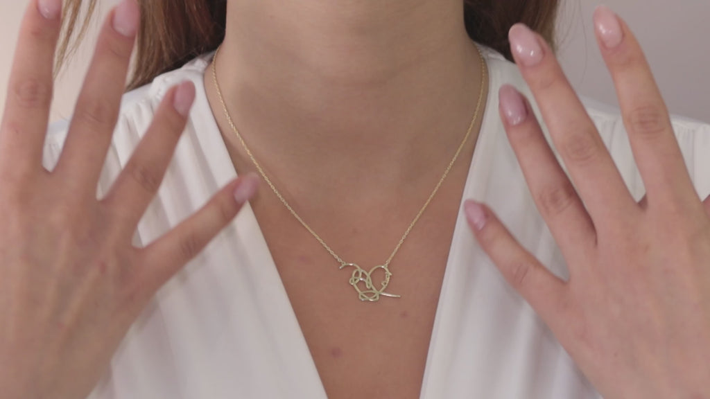 Custom heart necklace personalized with the name Lucy