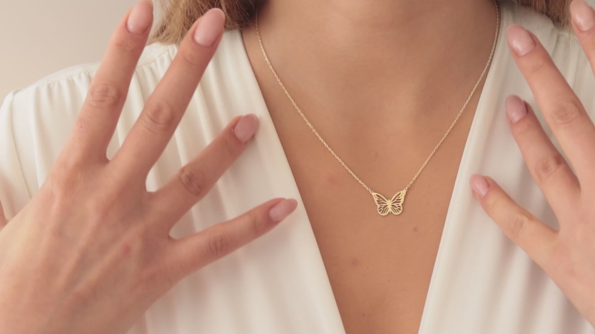 Butterfly necklace crafted in solid 14K yellow gold