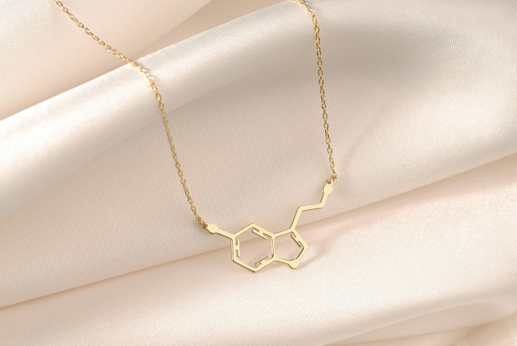 Close-up of the minimalist serotonin molecule pendant