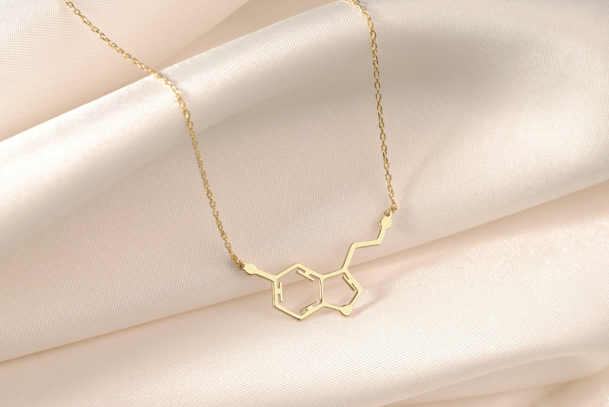 Close-up of the minimalist serotonin molecule pendant