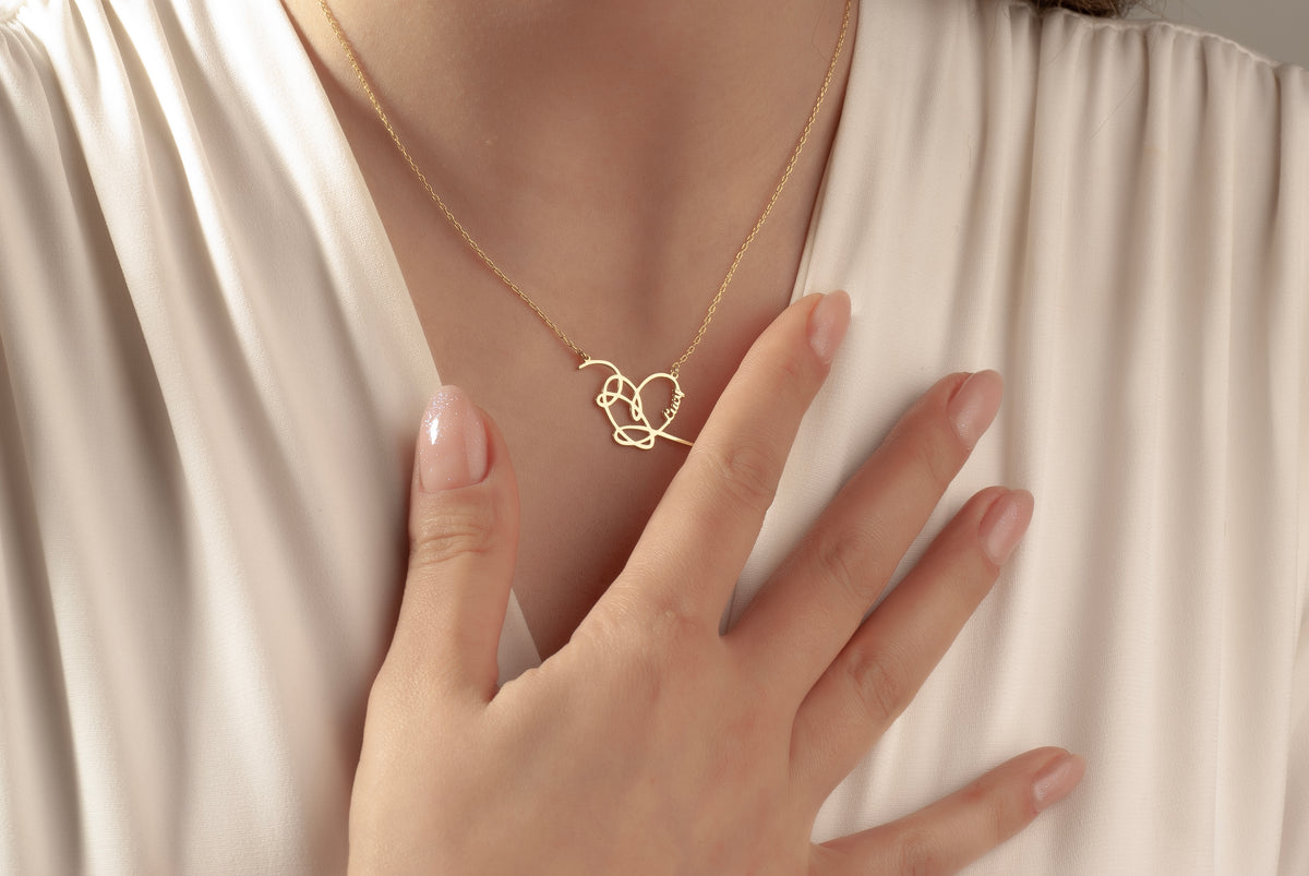 Personalized heart necklace presented in a Jovelle gift box