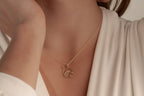 Delicate chain and pendant connection on squirrel necklace