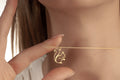 Dainty squirrel necklace in solid 14K yellow gold