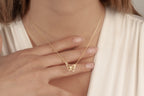 Butterfly necklace crafted in solid 14K yellow gold